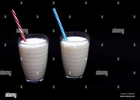 Milkshake isolated on a black background. View from top Stock Photo - Alamy