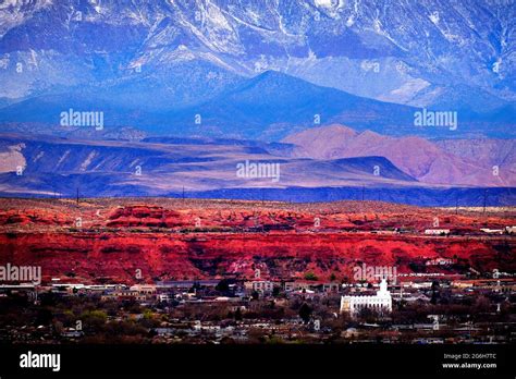 View of St. George Utah valley with Mormon LDS Temple red rocks and snow covered mountains Stock ...