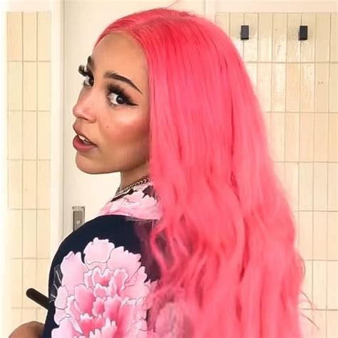 Woman with Pink Hair in Bathroom