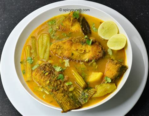 Katla macher jhol recipe - a light bengali fish curry- SpicyPunch