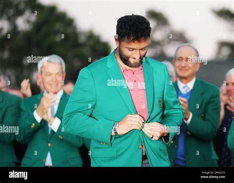 Augusta, USA. 9th Apr, 2023. Jon Rahm of Spain puts on the green jacket during the awarding ...