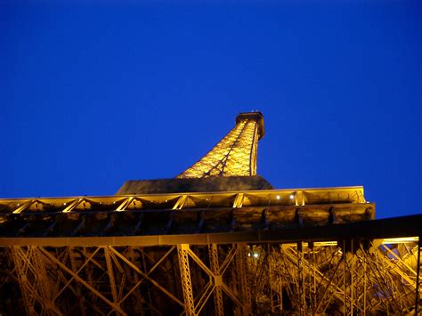 Free Stock photo of Looking Up at Eiffel Tower with Lights On | Photoeverywhere