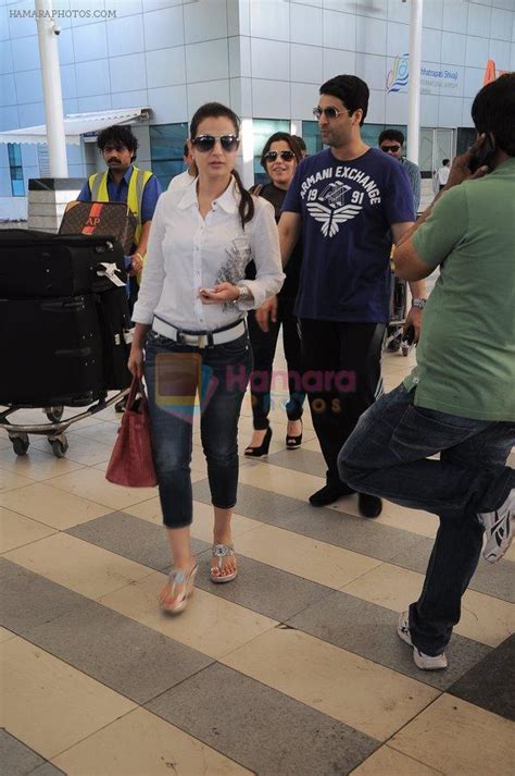 Amisha Patel return from Varun Dhawan's Wedding in Goa at Domestic Airport, Mumbai on 12th Feb ...