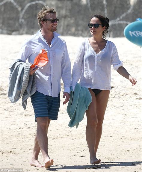 Simon Baker and his wife of 15 years cool off with a dip in the ocean | Daily Mail Online