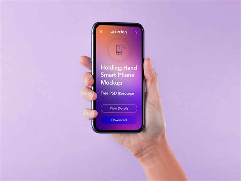 Free Hand Holding Smartphone Mockup (PSD)