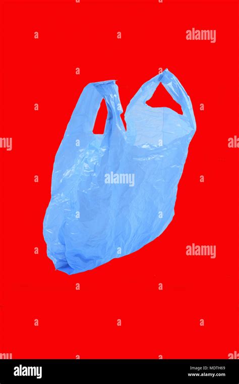 plastic bag isolated on red Stock Photo - Alamy