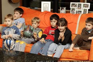 photo: kids watching a movie at the party - by seandreilinger