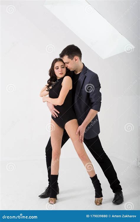 Beautiful Couple Dancing Bachata on White Background in Studio. Stock Photo - Image of modern ...