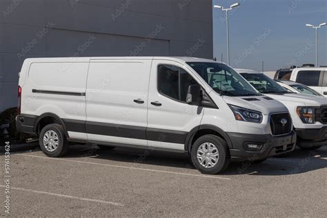 Ford Transit 150 Cargo display at a dealership. The Ford Transit is ...