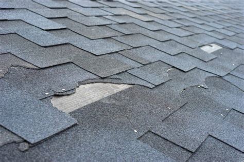 What Does Hail Damage Look Like on a Roof? | RoofClaim