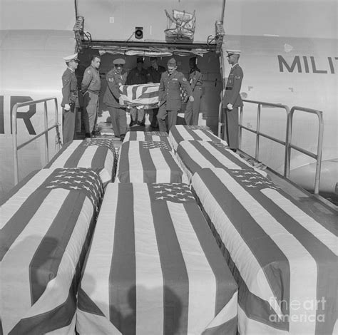 American Flag Covered Caskets by Bettmann