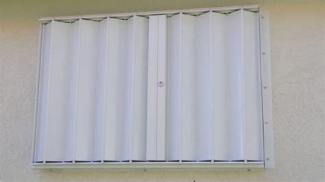 Tropical Hurricane Shutters & Products - Sample Accordian Shutter Pictures.