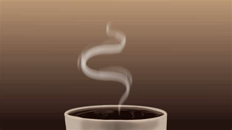 a cup of coffee with steam rising from it