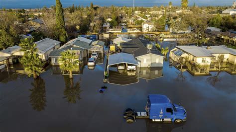 Landslides, sinkholes, floodwaters plague soggy California | AP News