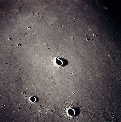 lunar orbit view: Oceanus Procellarum. Includes craters Schiaparelli C and Schiaparelli E ...