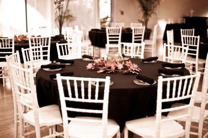 Love the black table cloth with the white chairs! | White chairs wedding, Black tablecloth ...