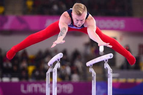How Are Men's Parallel Bars Scored in Gymnastics? | A Complete Guide to How Gymnastics Is Scored ...