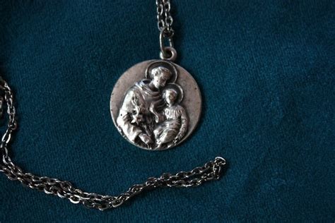 Vintage St Anthony medal with relic by chaoticwhimsey on Etsy