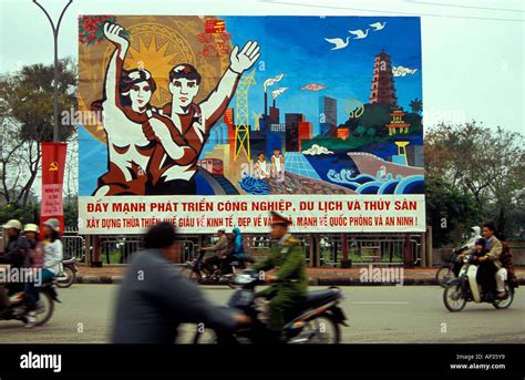 Communist propaganda Billboard on street of Hue, Vietnam Stock Photo ...