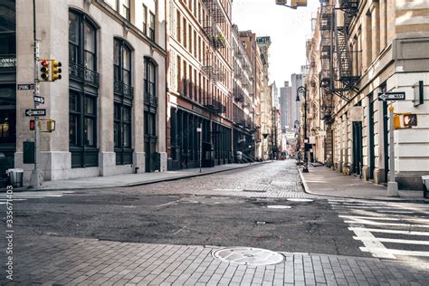 Empty street at sunset time in SoHo district in Manhattan, New York ...