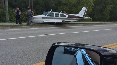 Small plane crash-lands onto Naples street