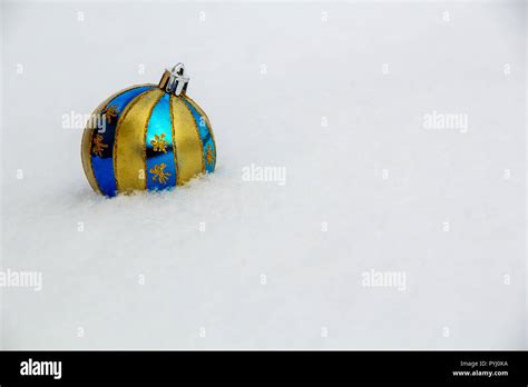 Christmas balls on the snow copyspace Stock Photo - Alamy