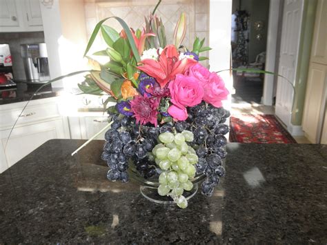 Sugar coated grapes flower arrangement | Flower arrangements, Plants, Arrangement