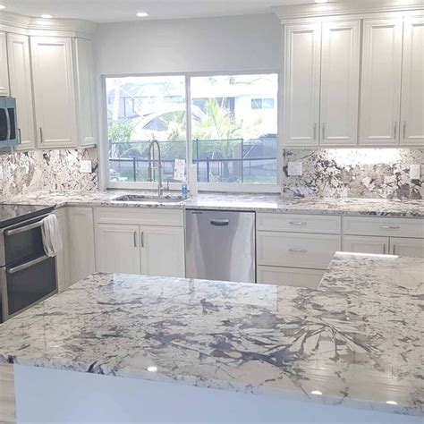 Cabinets.com on Instagram: “Do you prefer a full height granite backsplash over a tile one ...