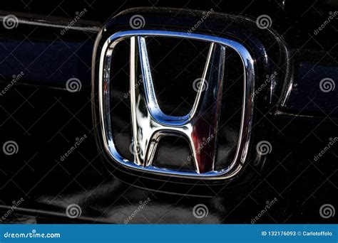 The Trademark Symbol of Honda in the Frontside of a Black Car ...