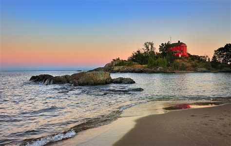 marquette Harbor Lighthouse sunset | Haunted places, Michigan, Pure michigan