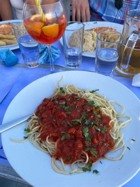 Fanari Restaurant in Fira Santorini in 2022 | Tasty pasta, Feta cheese ...