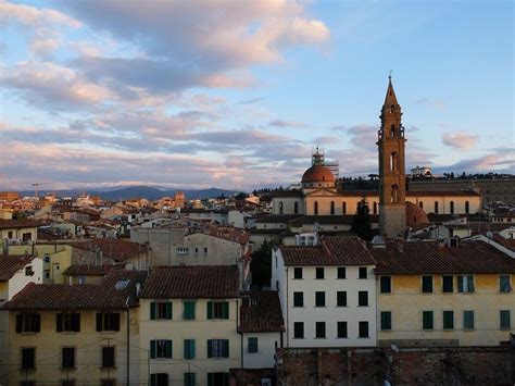 the city is full of old buildings and tall towers