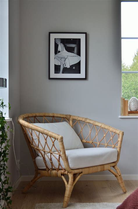 White Wicker Armchair Near White Wall · Free Stock Photo