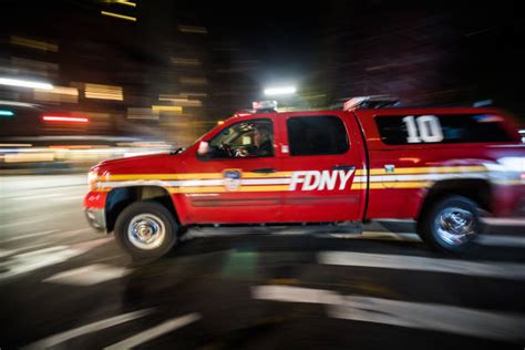 60+ Nyfd Fireman On Fire Department Truck In New York Stock Photos ...