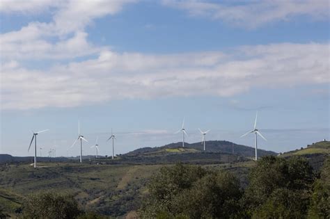 Premium Photo | White windmills on the hills