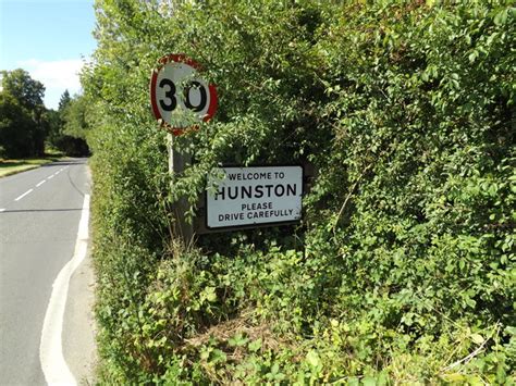 Hunston Village Name sign on The Street © Geographer :: Geograph Britain and Ireland