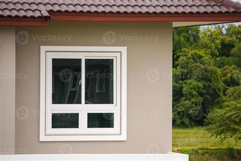 Modern window frame outside the house 12565222 Stock Photo at Vecteezy