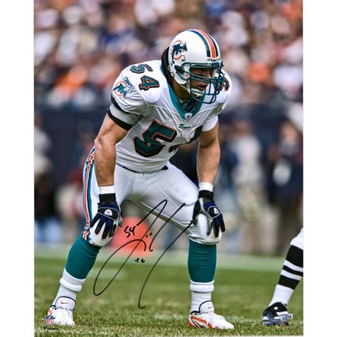 Zach Thomas Miami Dolphins Autographed 16" x 20" White Jersey Photograph