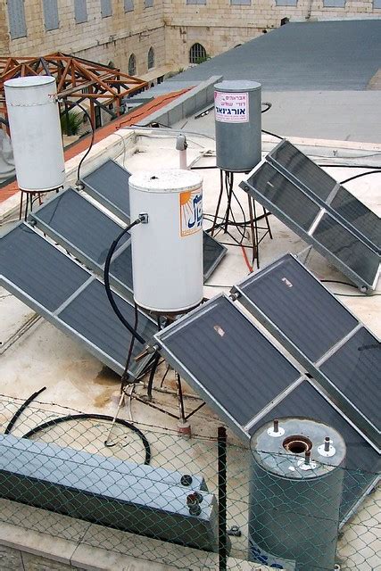Solar hot water heaters are found on many Israeli homes | Flickr