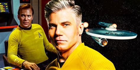 two men sitting at a table in front of a star trek ship with the ...