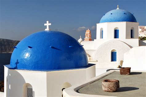 File:Reknown blue domes of the Church dedicated to St. Spirou in Firostefani, Santorini island ...