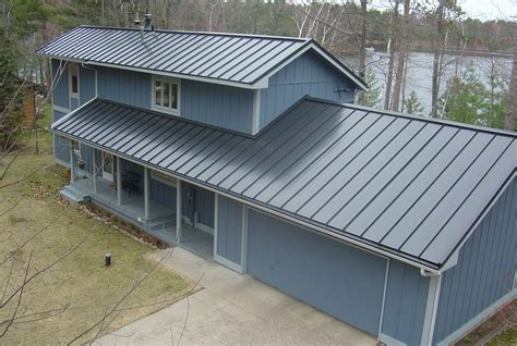 Standing seam metal roof in Slate Gray. Metal provided by Coated Metals Group. www.cmgmetals.com ...