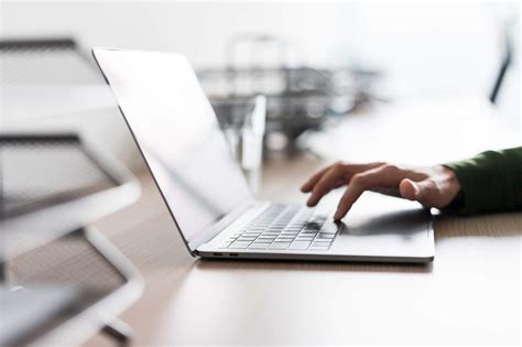 Man Using His Laptop in the Office Free Stock Photo | picjumbo