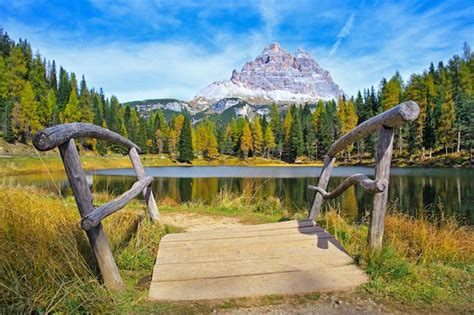 Premium Photo | Small lake in the alps with a wooden, small bridge