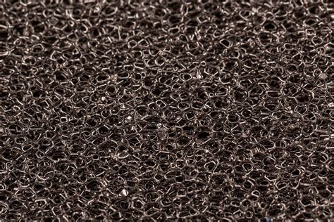 Texture of black sponge - finely dispersed filter element for aquarium filter, close up ...