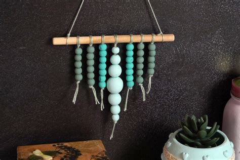 Simple Beaded Wall Hanging Decoration In A Triangle Shape