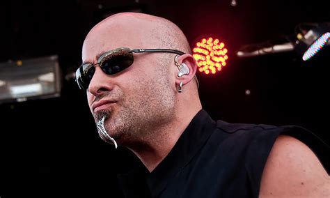 The singer of Disturbed has removed his signature chin piercing