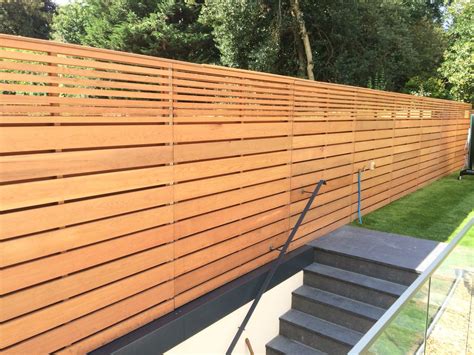 Cedar horizontal slatted garden fencing | Fence design, Garden fence panels, Modern garden design