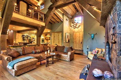 Mountain home interior designed in rustic style with solid wood, stone, thematic accessories a ...