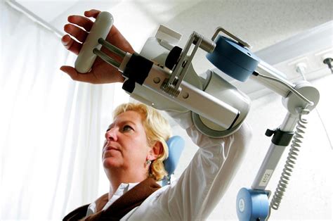 Physical Therapy Machine Photograph by John Thys/reporters/science ...